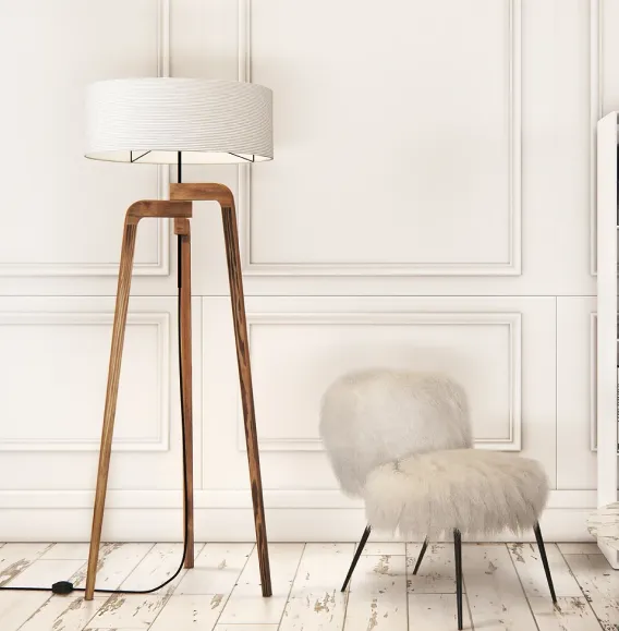 The Iris floor lamp is a wooden tripod of perfectly tessellating shapes, with a large lampshade to complete the aesthetically pleasing look.